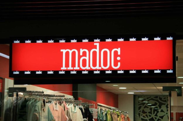 Attractive illuminated advertising for Madoc store