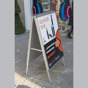 Informative sidewalk sign for Audio Line Store