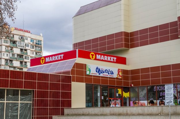 T Market illuminated sign