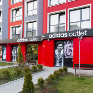 Adidas Outlet composite panel sign with embedded letters Adidas Outlet composite panel sign with embedded letters