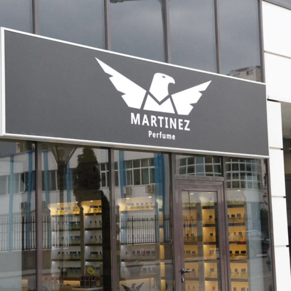 Illuminated sign with the logo of Martinez