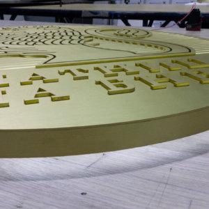 Halo illuminated brass sign and channel letters Halo illuminated brass sign and channel letters