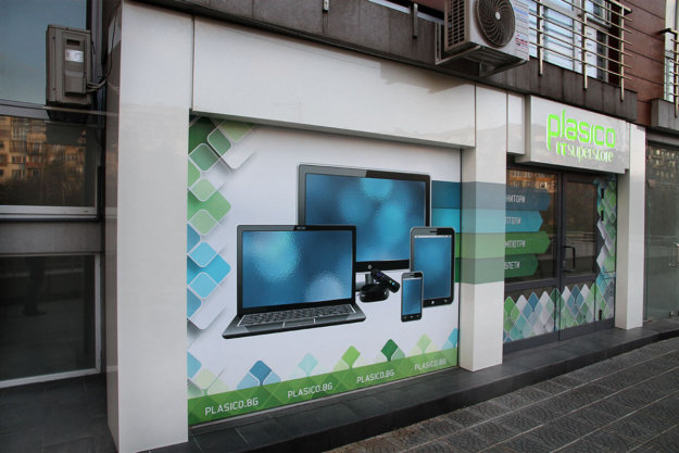 Branding of Plasico IT superstore with illuminated composite panel signs