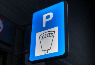 Illuminated parking sign