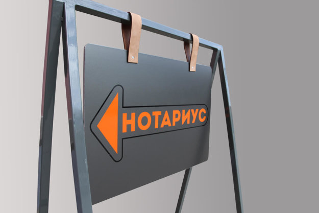 Metal sidewalk sign for a notary