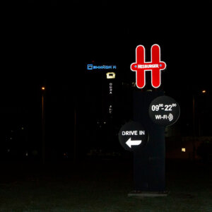 Illuminated totem with a non-standard shape welcomes customers Hesburger Illuminated totem with a non-standard shape welcomes customers Hesburger