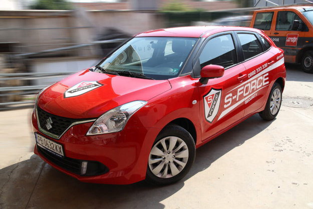 Wrapping letters with film 3M Scotchcal 50 of Suzuki Baleno