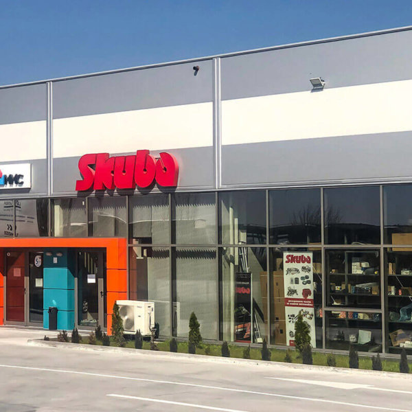 Illuminated 3D letters from aluminum Channel letters 3D Skuba mounted on a building at day light.