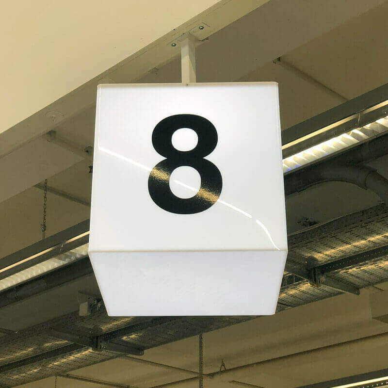 Illuminated box with number on a paycheck for stores interior signs