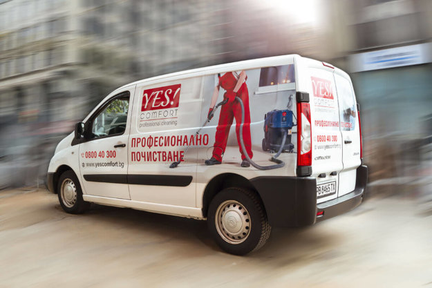 Car wrapping company bus with advertising graphics - Yes Comfort