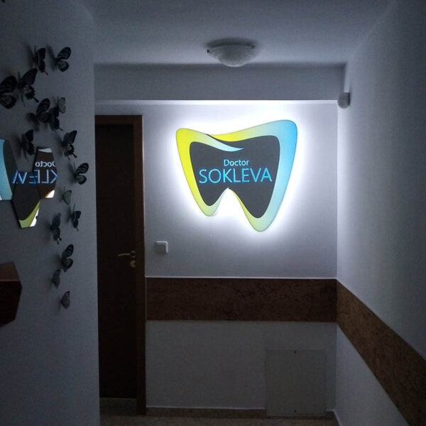 Attractive, unusual illuminated acrylic face sign