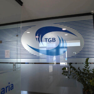Wrapping windows with frosted decorative film  – TGB Wrapping windows with frosted decorative film  - GV Logistics