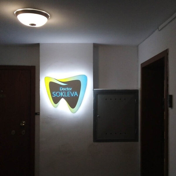 Attractive, unusual illuminated acrylic face sign