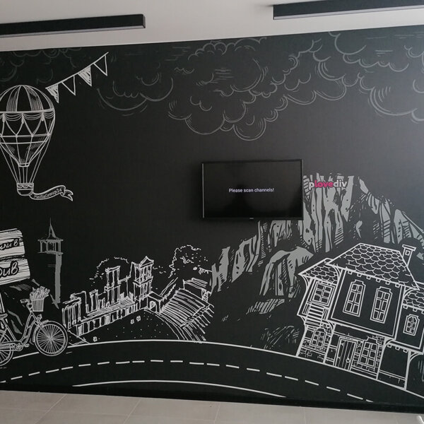 Wrapping a wall with self-adhesive film Wrapping a wall with self-adhesive film