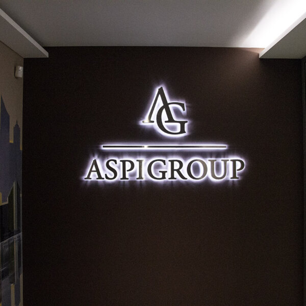 Backlit stainless steel channel letters for Aspi Group