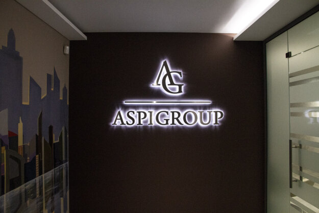 Backlit stainless steel channel letters for Aspi Group