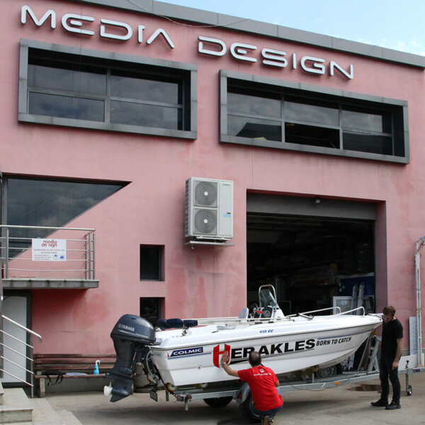 Branding a motorboat with advertising graphics