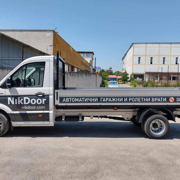 Branding a company bus for NikDOOR, Plovdiv Wrapping a company car for NikDOOR, performed by Media Design Advertising Agency