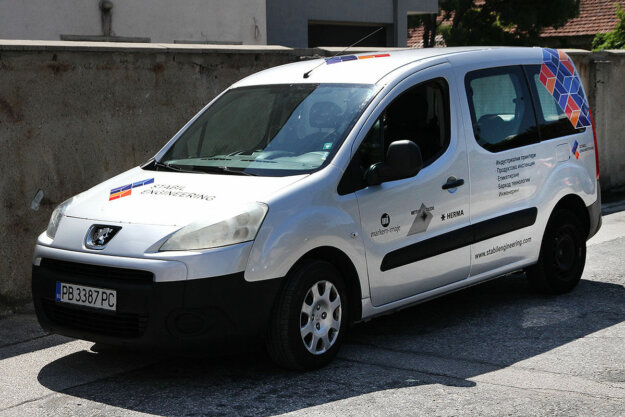 Wrapping company car with advertising graphics for Stabil Engineering, Plovdiv