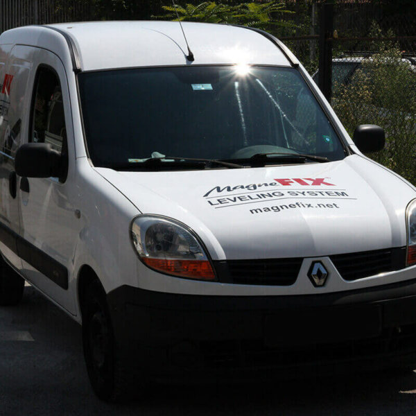 Advertising graphics on a company car by Media Design Advertising Agency