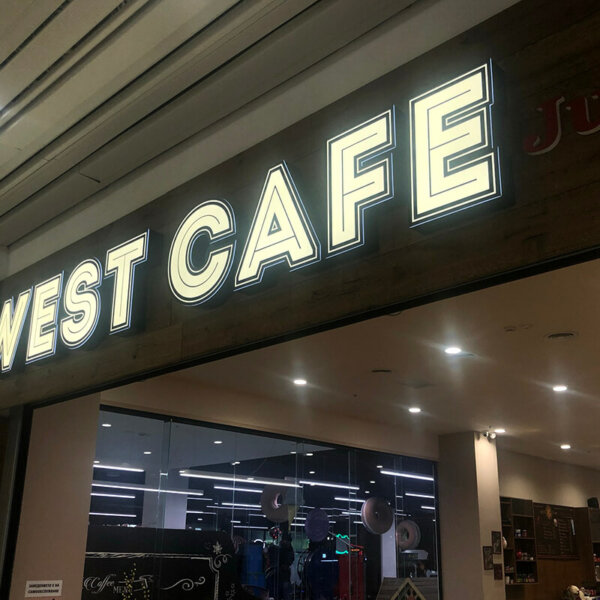 Illuminated channel letters and logo for West Café in Mall Plaza, Plovdiv Illuminated channel letters and logo for West Café in Mall Plaza