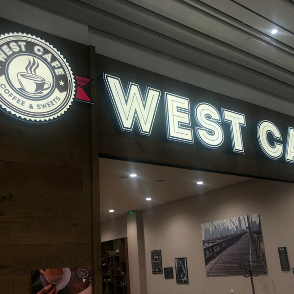 Illuminated channel letters and logo for West Café in Mall Plaza, Plovdiv Illuminated channel letters and logo for West Café in Mall Plaza, Plovdiv