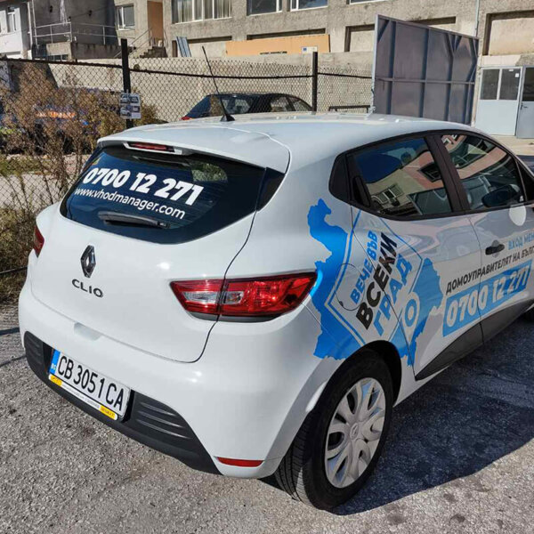 Branding a company car with advertising graphics for Vhod Manager Wrapping a company car with advertising graphics for Vhod Manager