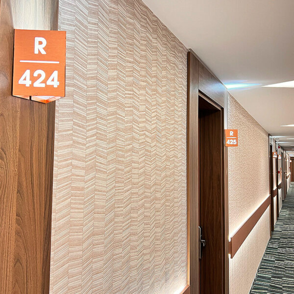 Illuminated signs for hotel rooms made of copper