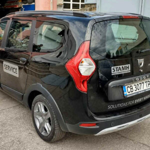 Branding Dacia with company logo using silver film Branding Dacia with company logo using silver film