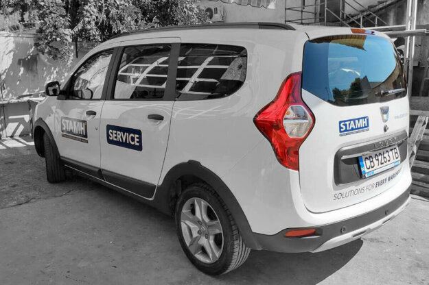Car wrapping using film graphics with Stamh logo