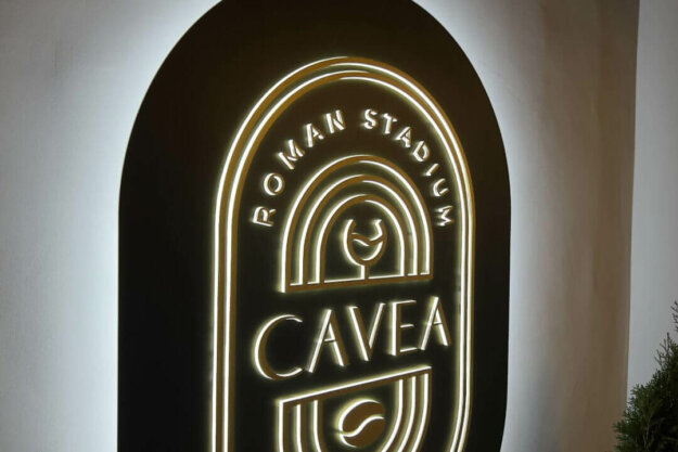 Embossed letters made of acrylic and brass