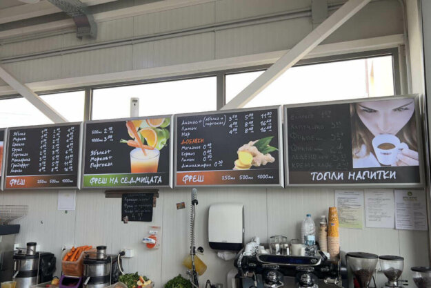 Illuminated snap frames for a menu in a store