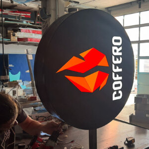 An advertising sign for Coffero store An advertising sign for Coffero store