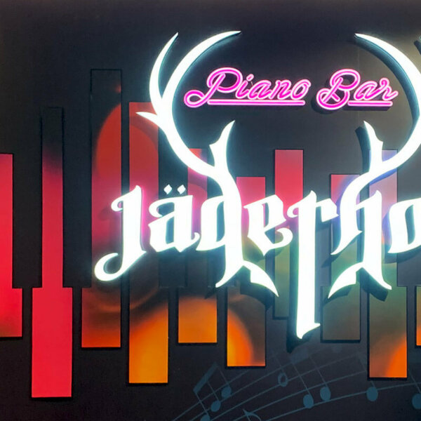 Illuminated logo Piano Bar Jägerhof for interior decoration