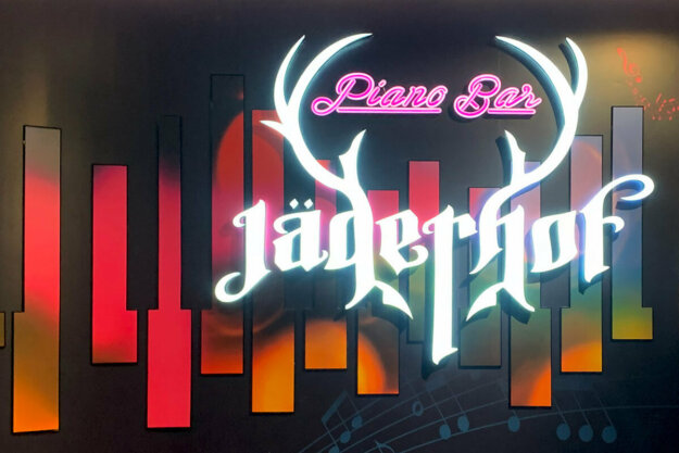Illuminated logo Piano Bar Jägerhof for interior decoration