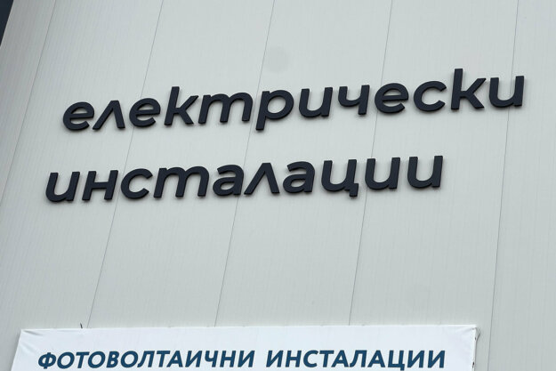 Embossed PVC letters in black on the facade of Ka Systems