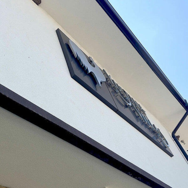 Stainless steel channel letters with spacers for a hotel complex in the village of Ustina Stainless steel channel letters with spacers for a hotel complex in the village of Ustina