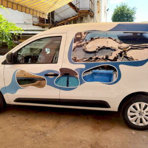 Wrapping a Renault company car with film graphics Wrapping a Renault company car with film graphics