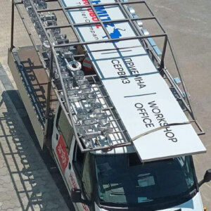 Advertising sign for an office in the Schmitz Cargobull service