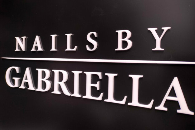 Fine white plexiglass letters on an etalbond base