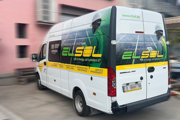 Bus branding with an advertisement of a photovoltaic company