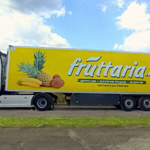Full branding of a refrigerated truck with advertising graphics Full branding of a refrigerated truck with advertising graphics