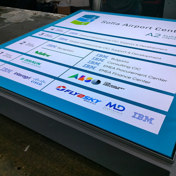 Sign with a textile face for a business center Sign with a textile face for a business center