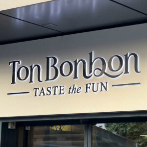 Refined and stylish illuminated sign for Ton Bonbon restaurant