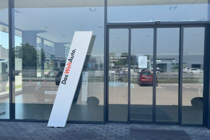 Non-illuminated totem with vinyl film lettering for car showrroom