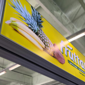 Double-sided illuminated sign for fruit warehouse Double-sided illuminated sign for fruit warehouse