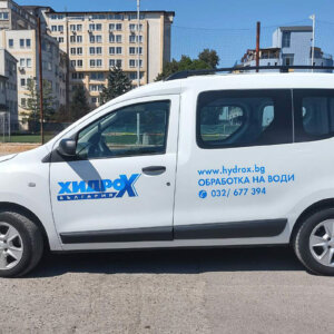 Company car branding using vinyl film logo and lettering Company car branding using vinyl film logo and lettering