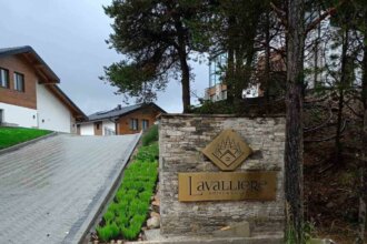 Lavalliere Hotel and Villas - Gold stainless steel sign with embossed letters