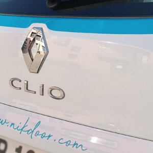 Vinyl film lettering on the back of a car Vinyl film lettering on the back of a car