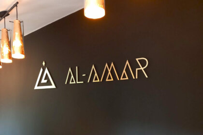 Embossed letters on a wall in an office